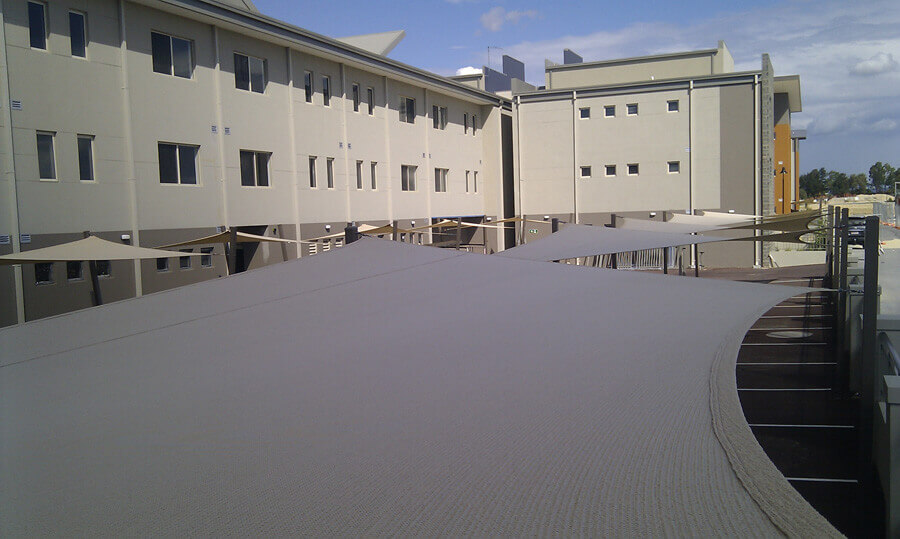 shade sail attached to tilt up concrete panel