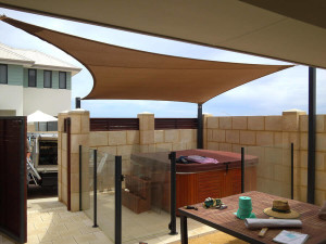 Shade sail over outdoor entertaining area